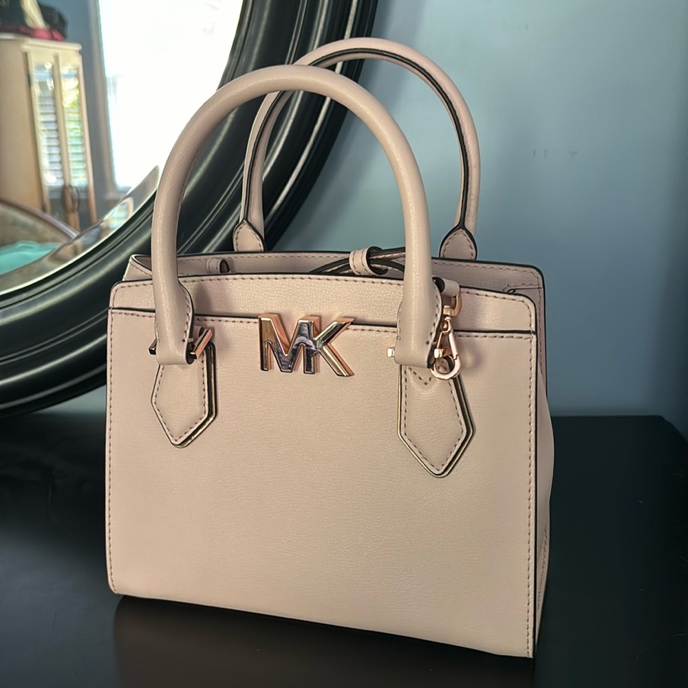 By far the cutest purses I have ever owned. Sadly no room for it.